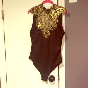 Black bodysuit with gold top